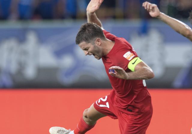 威廉体育-【中超】康拉德破门曼左基难救主 梅州2比1胜大连人